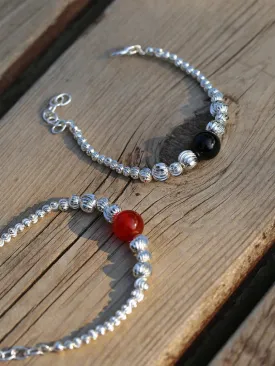 Graduated Silver Bean and Onyx Bracelet